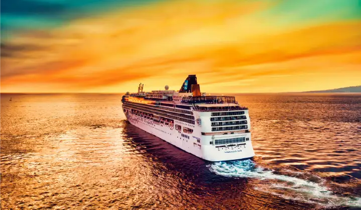 Cruise ship near white sand beach